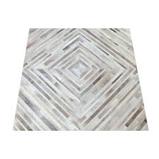 grey squared stripe design cowhide rug