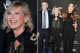 The singing superstar, known best for her hits have you never been mellow and. Olivia Newton John Cuddles Daughter Chloe Lattanzi Outside Dancing With The Stars Rehearsals Mirror Online