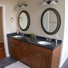 Find inspiration and ideas for your bathroom and bathroom the bathroom is associated with the weekday morning rush, but it doesn't have to be. Cherry Bathroom Vanity With Black Granite Top Oak Bathroom Vanity Diy Bathroom Vanity Double Sink Bathroom