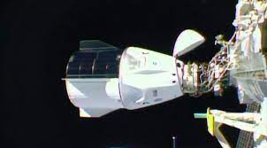 crew dragon docks to iss on first