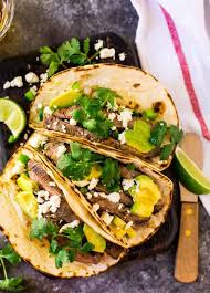 Be careful not to dry out the taco meat when you add the sauce. Flank Steak Tacos Easy Recipe For The Grill Oven Or Stove Top