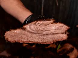 a brisket in an electric smoker