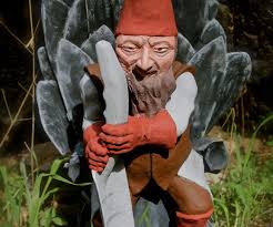 game of gnomes lawn sculpture