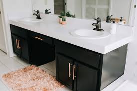 A new bathroom vanity top can be just what your bathroom needs for a fresh new look without a complete overhaul. Painting Laminate Cabinets And Countertop Under 100 Crazy Life With Littles Diy Home Decor