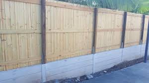 Combine Your Fence And Retaining Wall