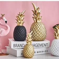 pineapple decor in gold white and