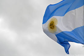 The blue and white colors behind the coat of arms symbolize the argentinian people and the beautiful land they inhabit. The Story Behind The Argentina Flag