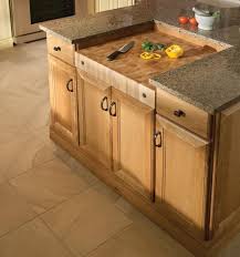 Countertop and water access lid. Yorktowne Cabinetry Built In Chopping Block