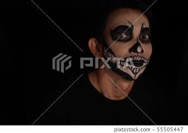 southeast asian man with skull face