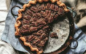 Add all but 1 tablespoon of the chopped walnuts and mix again. Recipe Southern Pecan Pie Laced With Whiskey From Jubilee By Toni Tipton Martin Texas Monthly