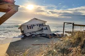 house collapses into ocean and ters