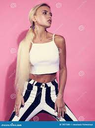 Blonde Young Model Posing in Strip Trousers and White Short Stock Image -  Image of background, makeup: 78575081