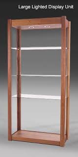 solid wood and glass shelving units