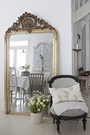 large ornate leaning mirrors