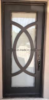 carved single leaf iron door entry