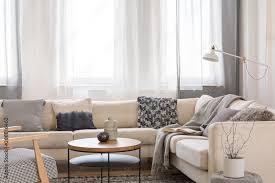 beige comfortable corner sofa with grey