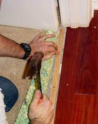 installing carpet against hardwood