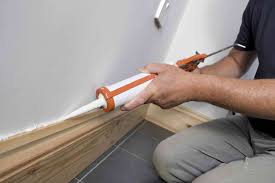 how to caulk baseboard gaps