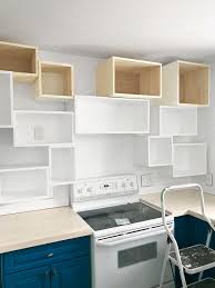 open kitchen cabinet cubbies for storage