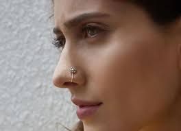 Your nose piercing should run you between $25 and $30 per piercing, though the jewelry is a separate cost. Danger Alert 6 Ways Nose Piercings Can Put Your Health At Risk