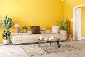 yellow wall décor ideas adding