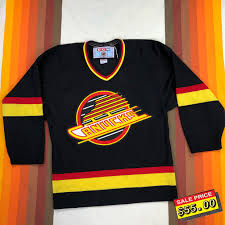 The options were the v jerseys from the early 1980s, the black/orange/red skate jerseys from the early 1990s, and the first version of the orca whale. Vtg 90s Ccm Vancouver Canucks Nhl Flying Skate Depop