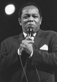Image result for 2005 - In Chicago, IL, Lou Rawls gave his last performance when he performed the national anthem of the United States to start Game Two of the 2005 World Series.