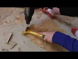 remove paper backing from wood floor