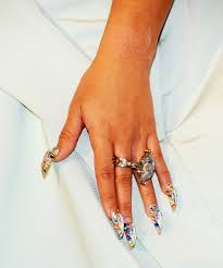 This enchanting manicure cardi b wore looks as if she has dipped her fingers in a pot of jewelry, stones and gems, like a fairy tale. Cardi B Nail Art Trends Crystal Manicure Inspiration