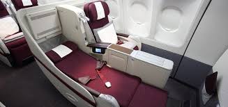 qatar airways upgrade to business cl