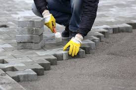 Solid Concrete Or Pavers Which Is