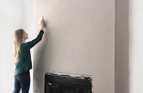 Work in smaller sized areas, so you can confidently apply the first coat in less than 30 minutes, giving you time to smooth off the finish. Diy A Cement Look Fireplace For Less Than 100 Angela Rose Home