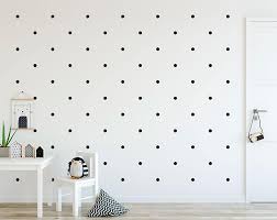 evenly space wall decals in a pattern