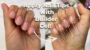 apply nail tips using builder gel