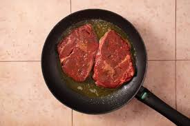 how to cook a rib eye steak without a