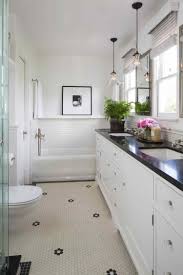 bathrooms with hexagon tile floors