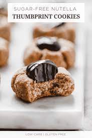 A must for every christmas! Made These Sugar Free Nutella Thumbprint Cookies With Almond Flour And My Easy Peasy Homemade Easy Gluten Free Desserts Sugar Free Nutella Almond Flour Cookies
