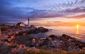 sun rocks dawn lighthouse portland