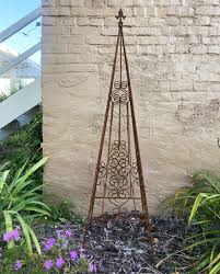 a rustic garden um metal scroll flower topiary garden obelisk