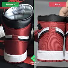 spot fake air jordan 1 satin black toe