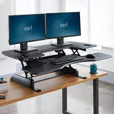 Ergonomic features like a beveled front edge and raised monitor shelf keep you comfortable and relaxed while accessory support for headphones and drinks. Varidesk Pro Plus 48 Adjustable Height Desk Converters Vari