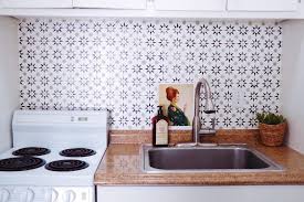 Today we're going to share with you a stenciled backsplash featuring our fabiola tile stencil. Hand Stenciled Tile Backsplash Diy Darling