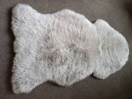 sheepskin rug bidbud