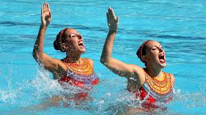 why olympic synchronized swimmers use