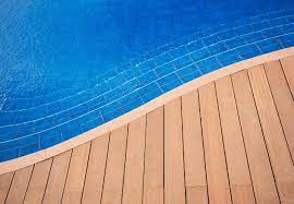 For instance, if your pool is surrounded by foliage, stone decking can help complete a natural look. 6 Pool Decking Options Top Design Tips Bob Vila
