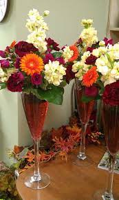 Centerpieces In A Large Champagne Glass