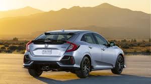 Click on badge to learn more. 2020 Honda Civic Sport Touring First Test Even Better With A Hatch