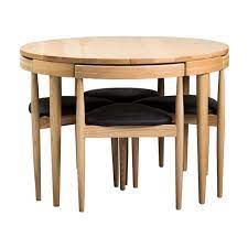 A moden table with solid beech legs, suitable for dining or working. Replica Olsen Extendable Dining Table Ash 5pc Nood