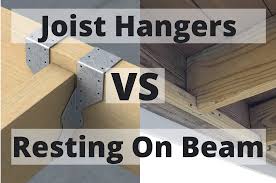 joist hangers vs resting on beam 7
