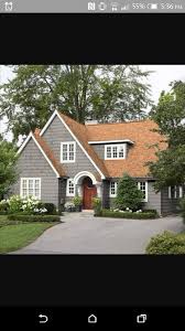 Gray With Tan Roof House Paint